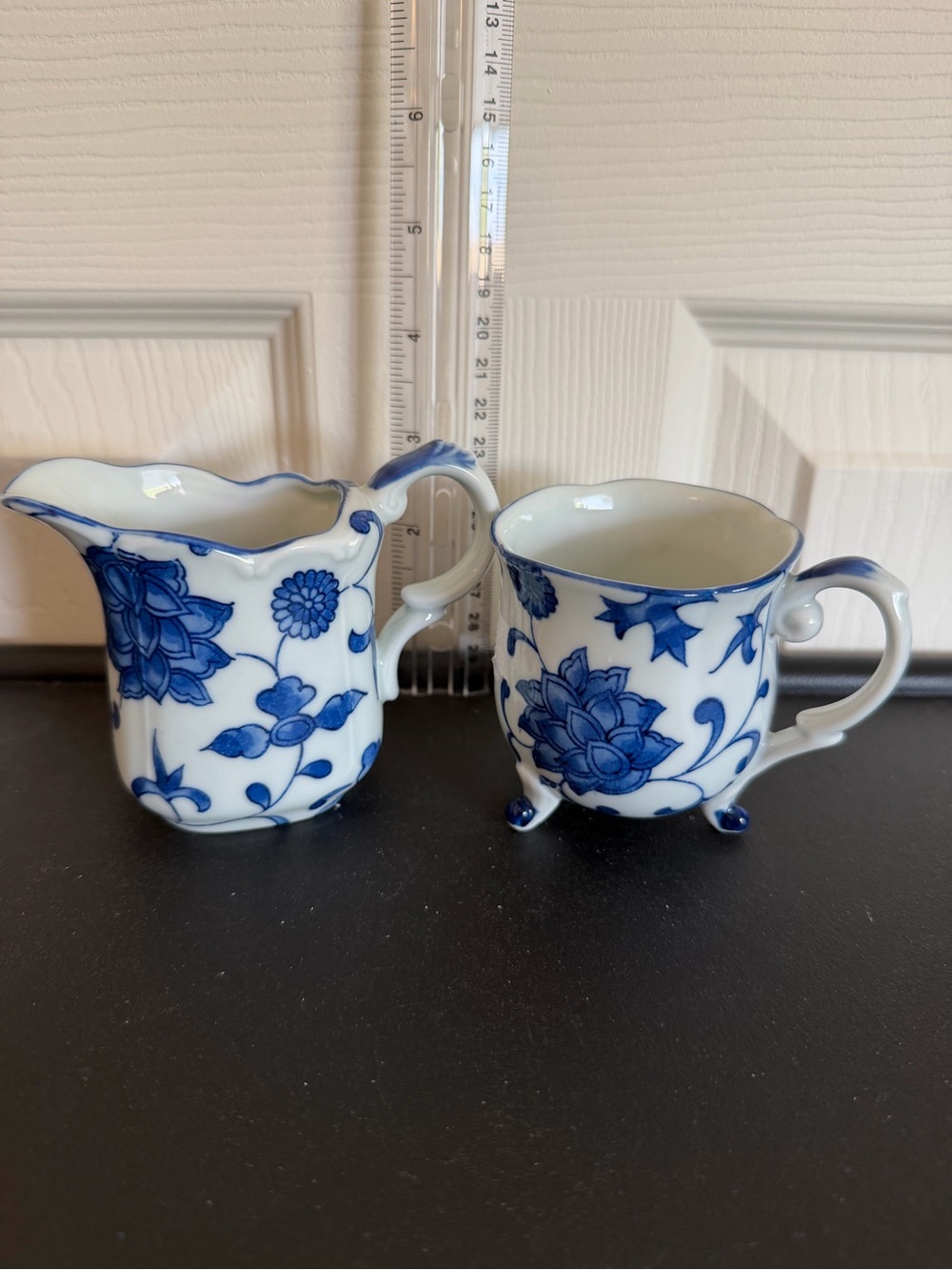 Blue and White Floral Porcelain Creamer and footed Sugar/Cup Set. No lid
